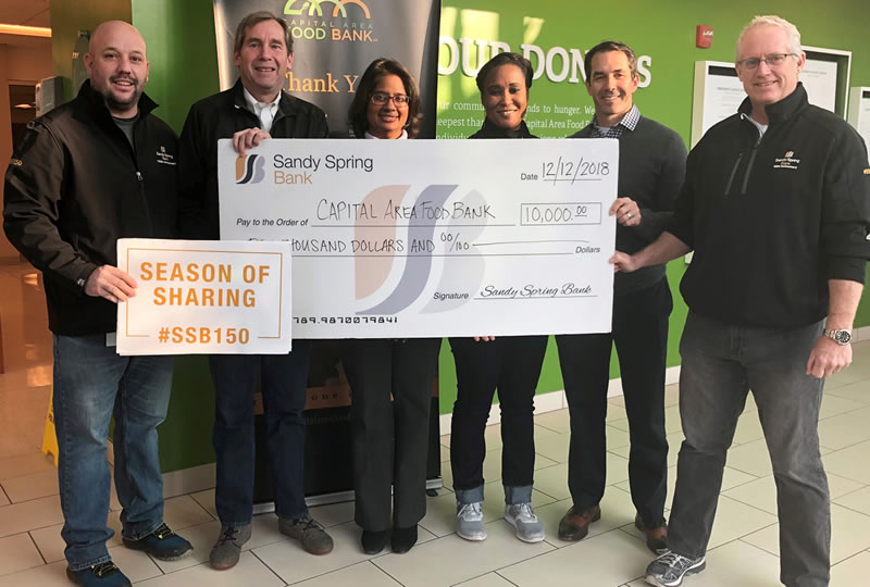Sandy Spring Bank Employees give a $10,000 check to the Washington DC Food Blog