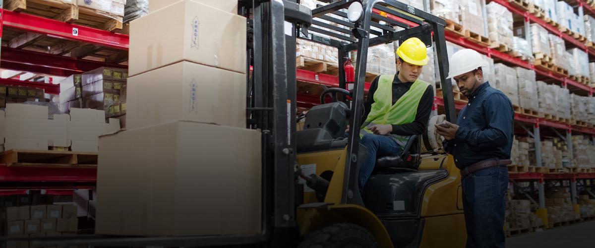 Man in forklift. Sandy Spring Bank Wholesale Suppliers and Distributors